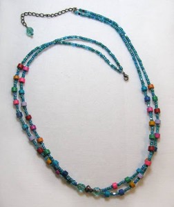 Bead stringing with multiple strands